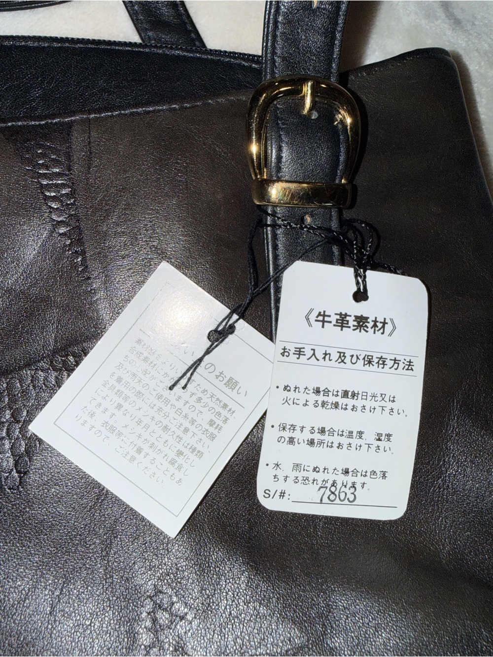Black Leather Shoulder Bag with Gold-Tone Buckle Details - Picture 5 of 8